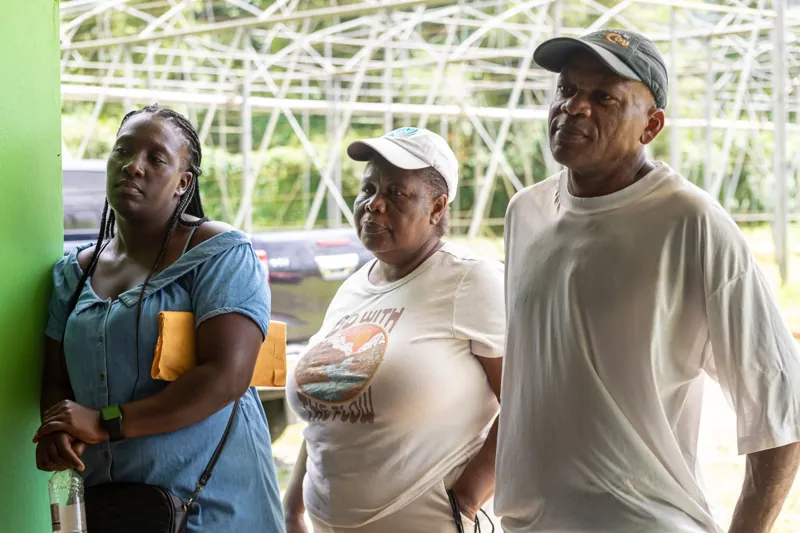 Three participants listening during a gathering